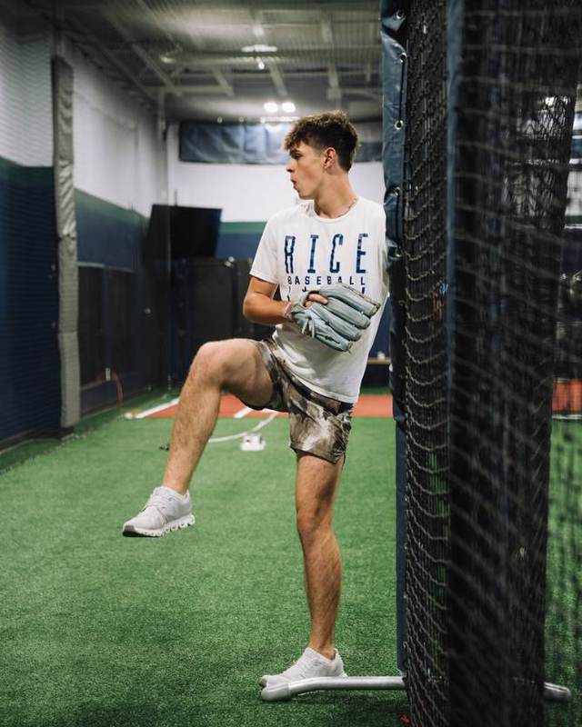 College pitcher in his delivery