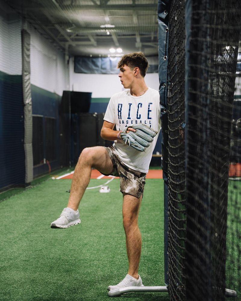 Pitcher in his leg lift on the mound at Compete BP