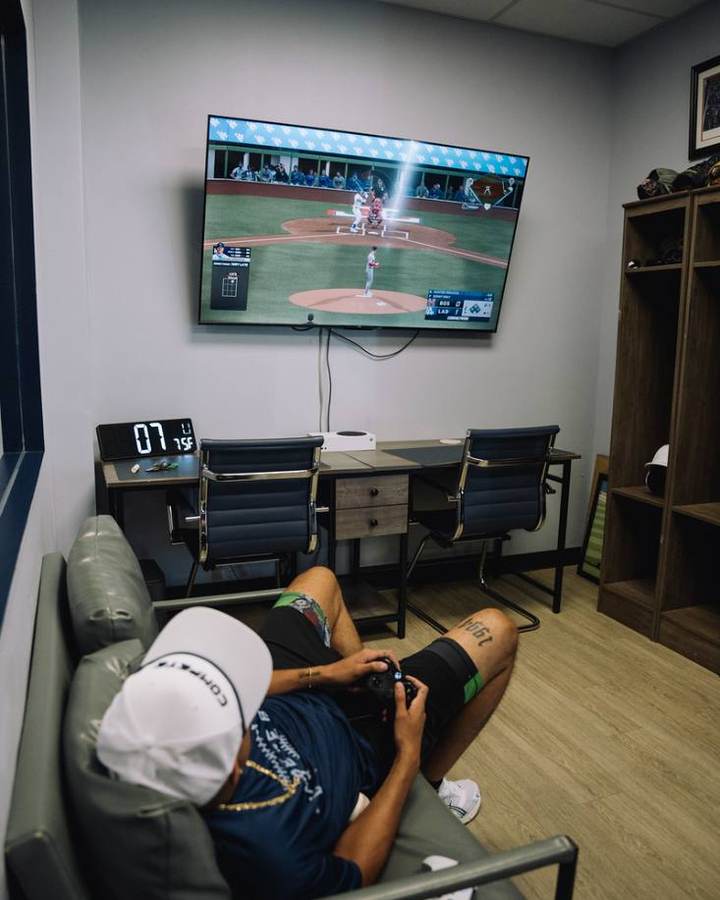 Players' lounge with seating and TV